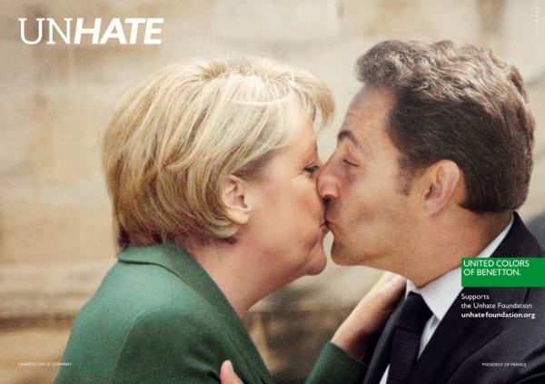 Angela Merkel and Nicolas Sarkozy kiss